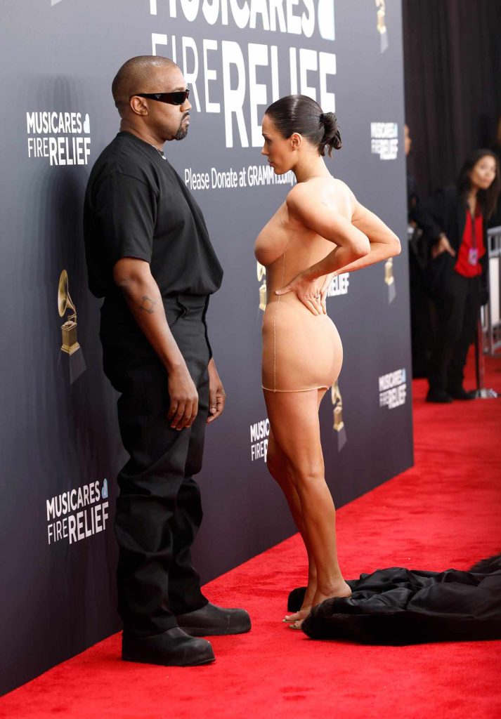 "Kanye West and Bianca Censori push boundaries with their public affection, sparking debate and capturing attention at the Grammys."



