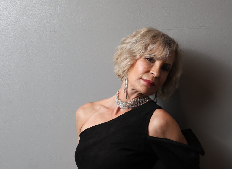 Explore Gaby Haas’s journey from fitness modeling in Europe to dominating U.S. fashion shows, magazine covers, and billboards.